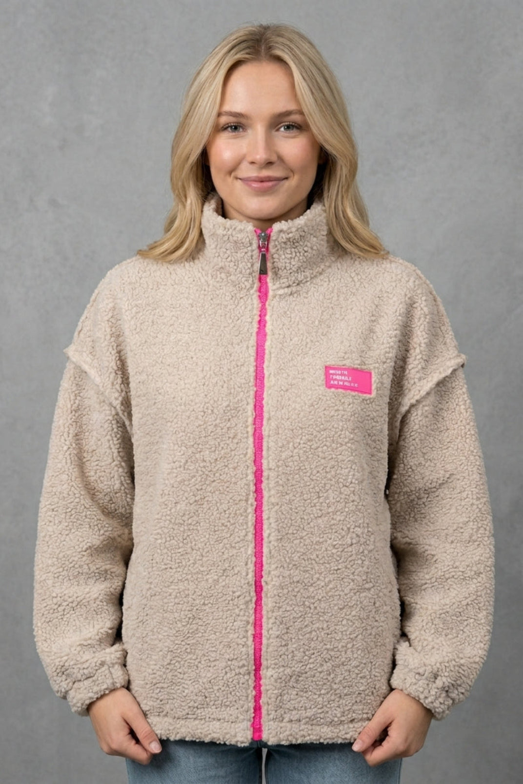 Damen-Teddy-Fleecejacke in Beige mit pinkem Reißverschluss, Ansicht 1